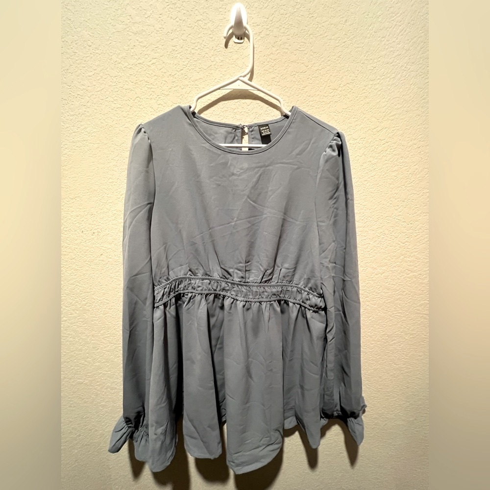 Shein maternity blouse, baby blue color, size Xl, material is 100% polyester.